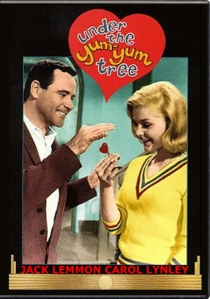 Man handing heart-shaped key to a woman.